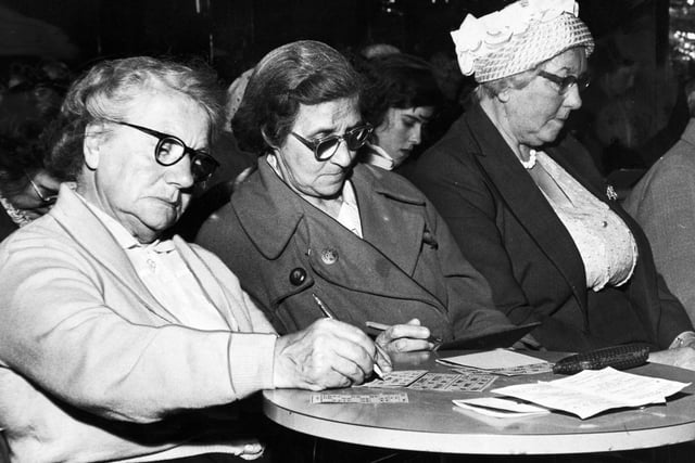A study in concentration as players mark their bingo cards in June 1962.