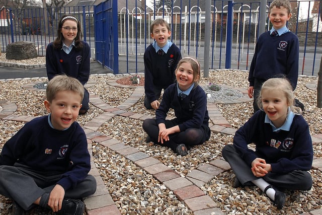 St Joseph's School council pupils pictured in the new entrance where every pupil in the school laid their own brick in 2007