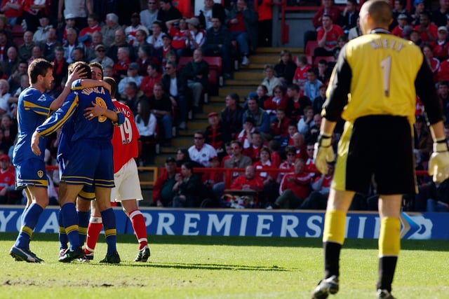 Mark Viduka is congratulated by Eirik Bakke and Harry Kewell after completing his hat-trick at The Valley.