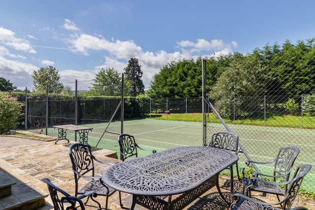 Residents have use of the tennis court in the communal garden