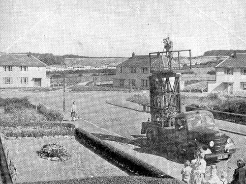 The Championship Garden on the Seacroft estate. A cameraman is filming from a platform on board a truck to record the winning garden
