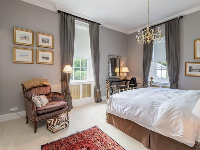 Large windows allow light to flood the house