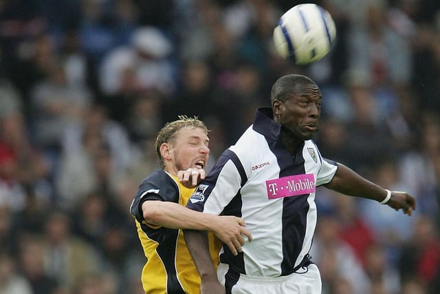 Stephane Henchoz competes for the ball
