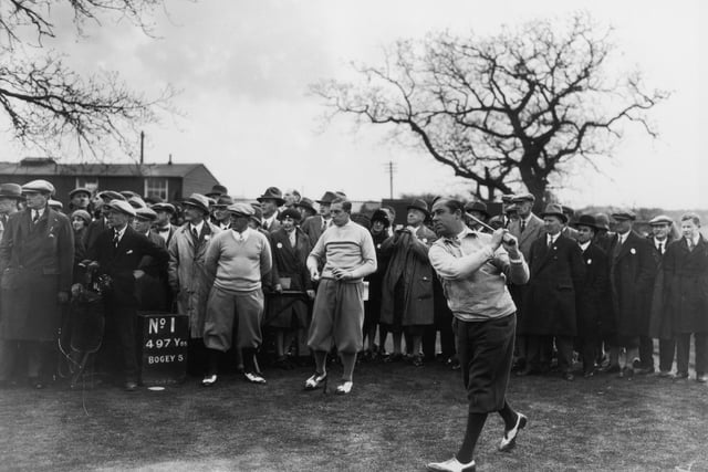 American golfer and captain of the USA Ryder Cup team, Walter Hagen tees off from the 1st.