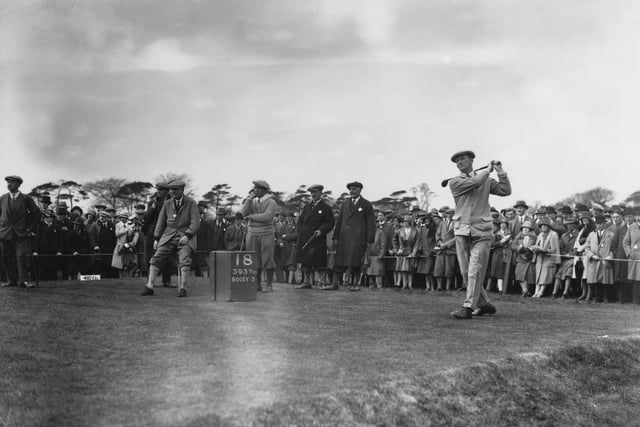 Fred Robson tees off on the 18th. Standing, centre, is Gene Sarazen of the USA.