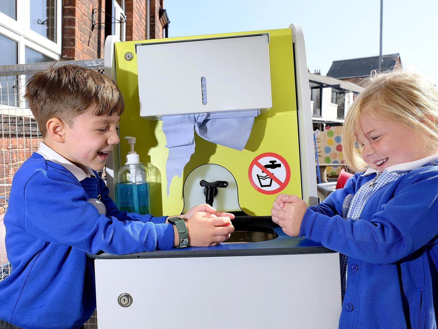 Hand-sanitising at Gladstone Road School.