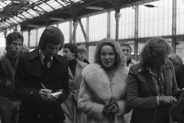 Bing's wife Kathy chats to reporters at Preston railway station