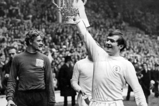 Terry Cooper celebrates with the League Cup trophy after scoring the winning goal against Arsenal at Wembley.