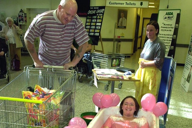 The ASDA store at Killingbeck went pink for two weeks for the supermarket's annual Tickled Pink Campaign in aid of Breast Cancer Care. Pictured is supermarket assistant Sarah Gregson in a bath of blancmange.