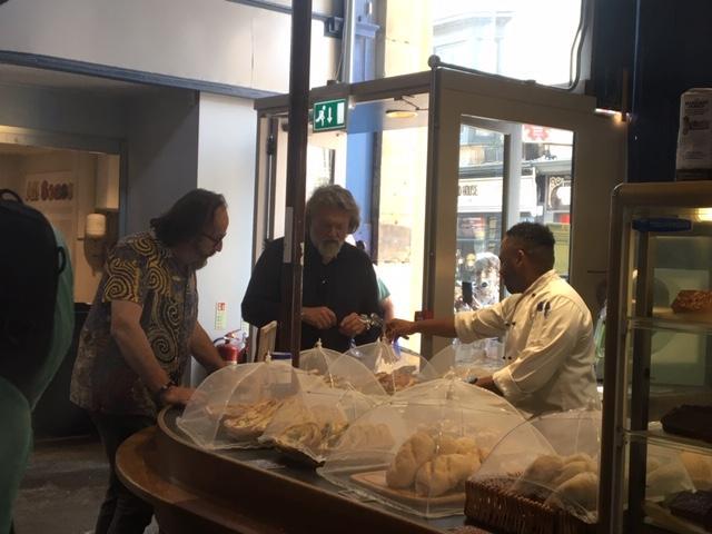 Sampling some of the produce with Jose Tauares, owner of Solange Bakery.