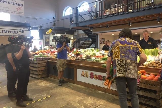 Filming in the market.
