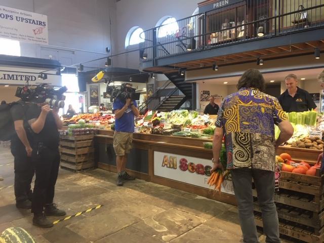 Filming in the market.
