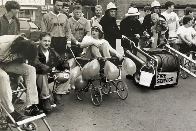 Racers line up to take part in the South Elmsall pram race