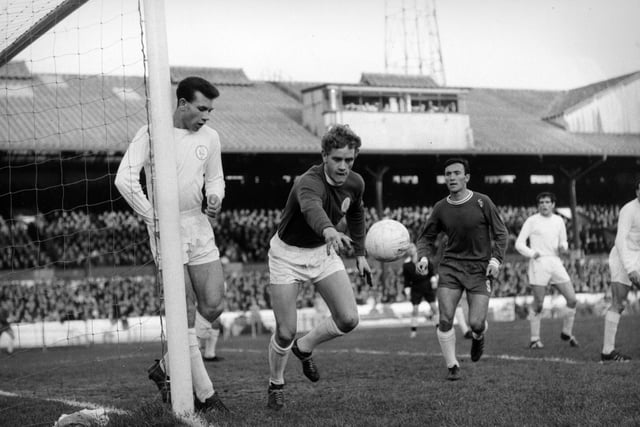 Gary Sprake pushes a shot round the post as Barry Bridges attacks for Chelsea at Stamford Bridge in November 1965.