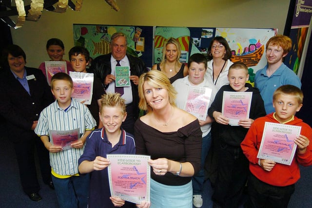 Kids gain certificates after producing work about a Guide to Scarborough, front, Joshua Brady and Snr Project Worker Julie Kelly of U Turn.