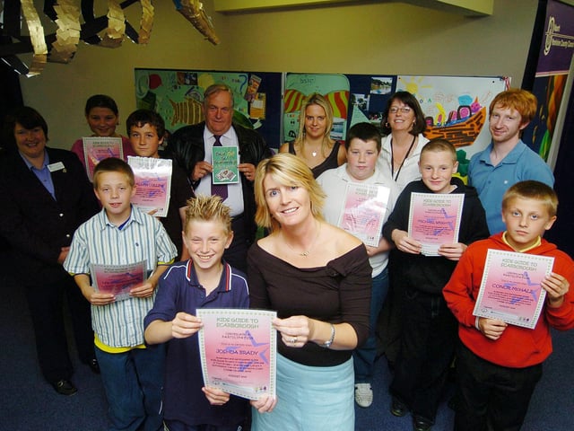 Kids gain certificates after producing work about a Guide to Scarborough, front, Joshua Brady and Snr Project Worker Julie Kelly of U Turn.