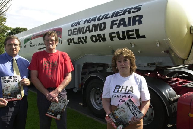 Protesting at Charnock Richard Services against fuel tax are, from left, Chris Fylan, area manager Road Haulage Association, Malcolm Stewart and Margaret Stewart of MC and MA Stewart Haulage of Coppull