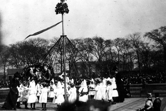 A group of children take part in Maypole dancing in this undated photo. Many schools took part in this, a regular activity at the Carnival during that period when the event was held in early May every year.