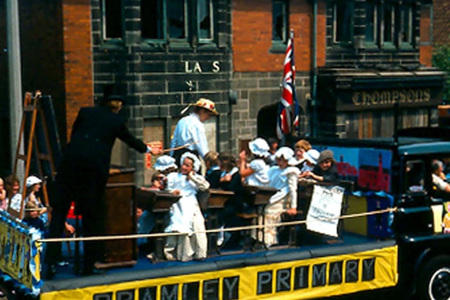 Bramley Primary School's float in the Bramley Carnival of July 1976. Teachers and pupils are dressed in Victorian costume and are depicting a Victorian school day.