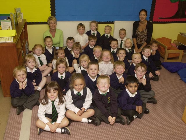 St Peter' School in 2003, with Classroom Assistant Mrs Batters and (right) teacher Mrs Sykes.