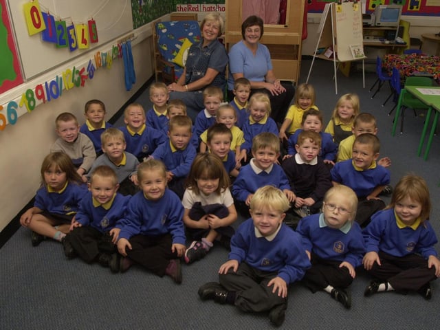 Class 7 new starters at Braeburn in 2003 with their teacher Mrs Watts (back left) and Nursery Assistant Mrs Buckle (back right).