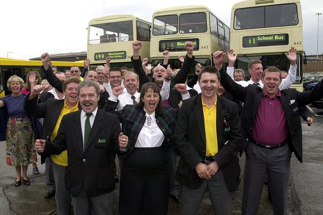Drivers from Blackpool Transport celebrate their first fuel delivery