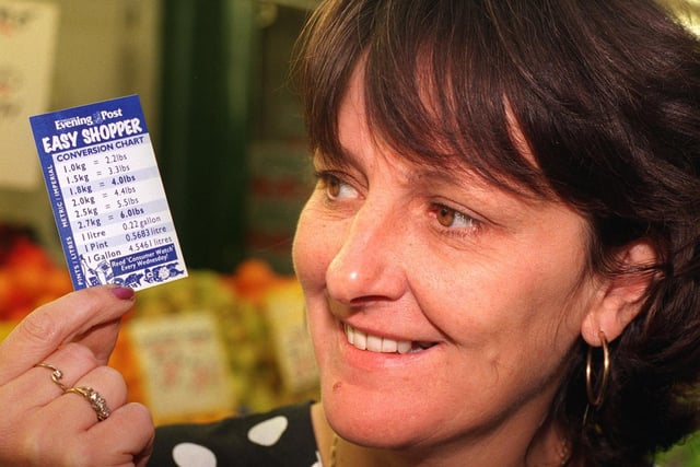 Janet Gough with an Easy Shopper metric conversion cards produced for your YEP.