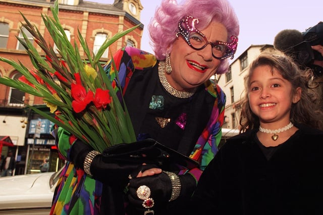 Dame Edna arrived at Leeds Grand to promote her show. She was greeted with a bunch of gladioli from Rosha Bassiri, 10, from Alwoodley.
