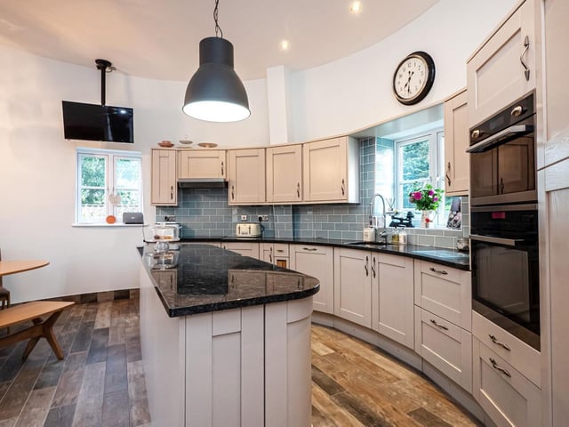 A stunning kitchen sits at the base of the windmill
