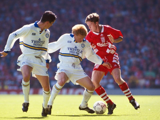 Gordon Strachan and Gary Kelly attempt to halt Liverpool's Steve McManaman during a Premier League match at Anfield in August 1993.