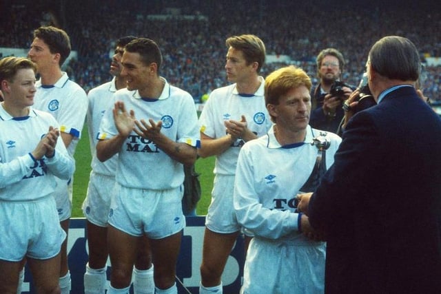 Gordon Strachan is handed the Second Division trophy. The Whites were playing Genoa at Elland Road in a friendly just days after winning the Second Division title at Bournemouth.