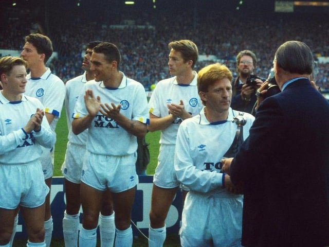 Gordon Strachan is handed the Second Division trophy. The Whites were playing Genoa at Elland Road in a friendly just days after winning the Second Division title at Bournemouth.