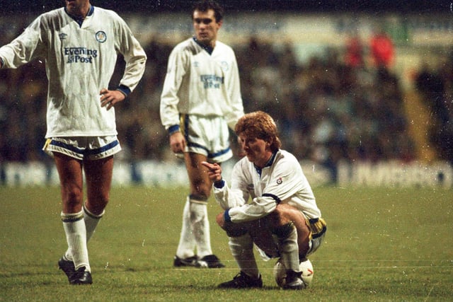 Gordon Strachan sits on the ball and plots a free kick during the clash with Manchester United at Elland Road in late December 1991.