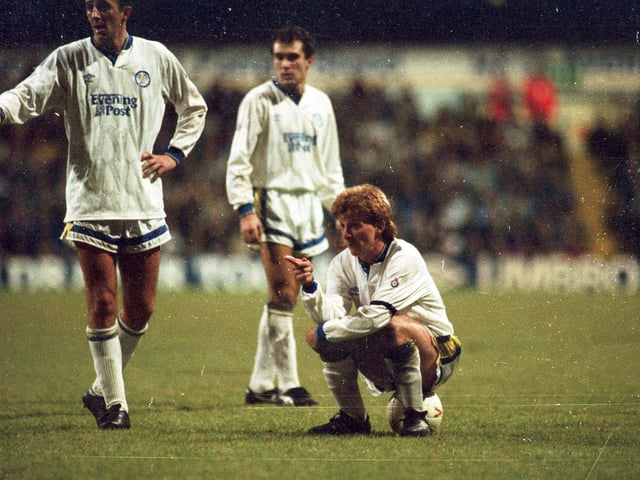 Gordon Strachan sits on the ball and plots a free kick during the clash with Manchester United at Elland Road in late December 1991.