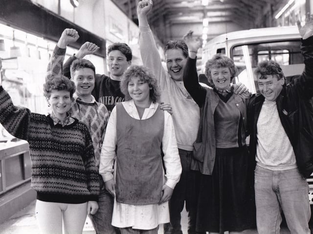Traders celebrate after hearing that the redevelopment scheme has been halted.