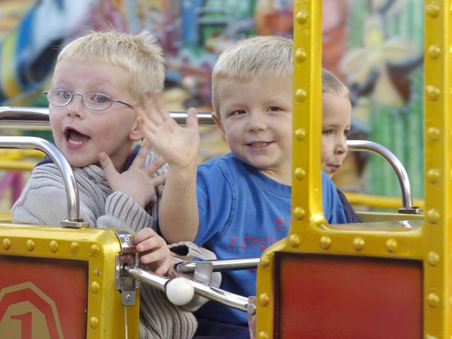 Excited faces on the train ride at Scarborough Fair.