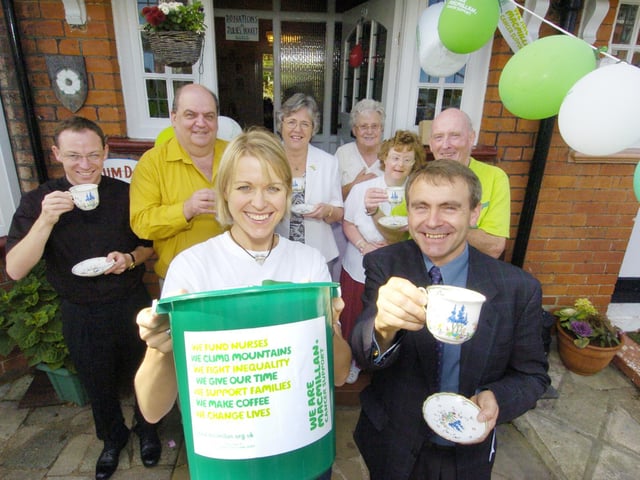 Macmillan coffee morning at Holbeck Hill (front l to r): Community Fundraiser Heidi Maxton and Scarborough MP Robert Goodwill.