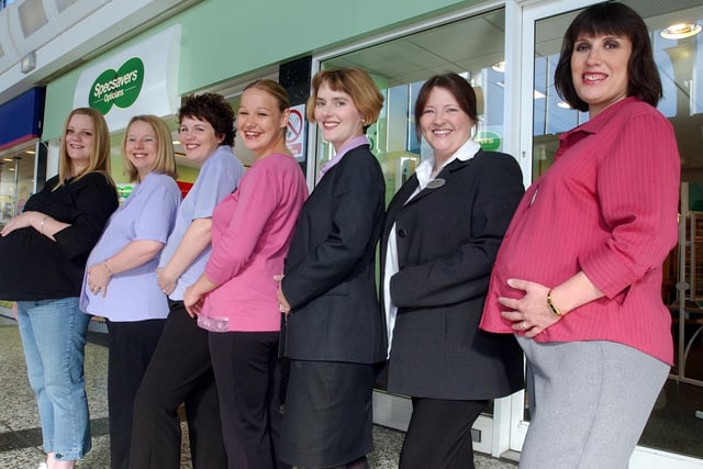 Seven colleagues at Specsavers in Cross Gates who were all pregnant at the same time. Pictured from left, Vanessa Longdon, Tina Walker, Hayley Doyle, Charlotte Mear, Clare Sheppard, Kim Wood and Alison Woodlock.
