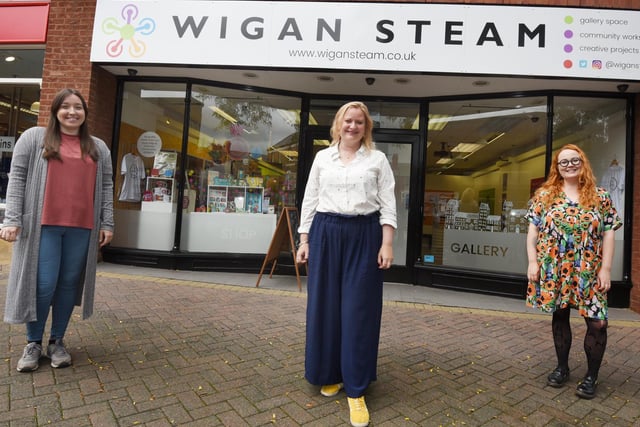 A new exhibition 'Our Town' celebrating people and places in the Wigan borough and shop now open to the public at Wigan STEAM, Marsden Street, Wigan town centre.  from left, Louise Robson, Elizabeth Parsons and Emily Calland,