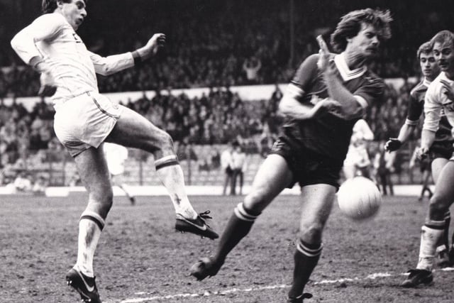 Peter Lorimer shoots towards goal against Barnsley at Elland Road in February 1984 but an appeal for a penalty was dismissed by the referee. The Whites lost 2-1.