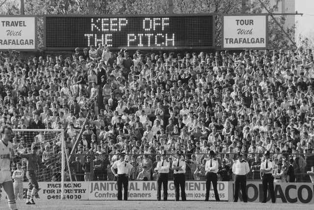 Police patrolling the pitch during Leeds United's game against Chelsea at Stamford Bridge in April 1984. The Whites lost 5-0.