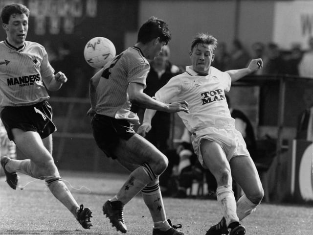 David Batty tangles with a Wolves player during Leeds United's 1-0 defeat at Molineux in April 1990.