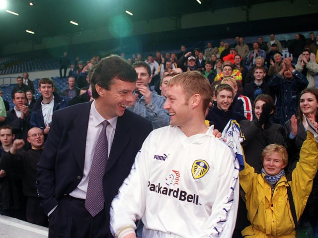 David Batty with manager David O'Leary, and hundreds of fans who turned up at Elland Road to welcome him back to Leeds United in 1998.