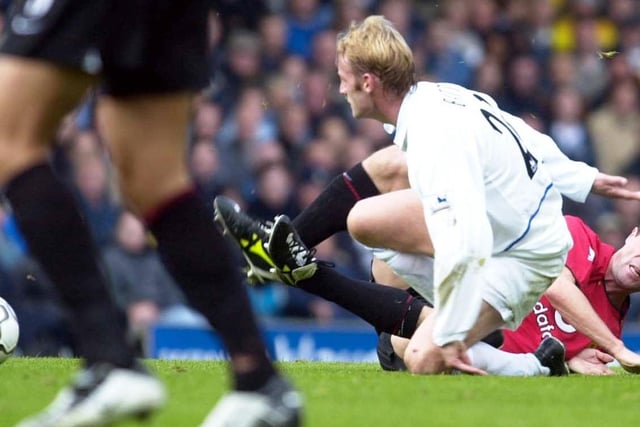 Batts and Roy Keane in a tussle in the heart of midfield during Leeds United's clash with Manchester United at Elland Road in October 2003.