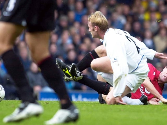 Batts and Roy Keane in a tussle in the heart of midfield during Leeds United's clash with Manchester United at Elland Road in October 2003.