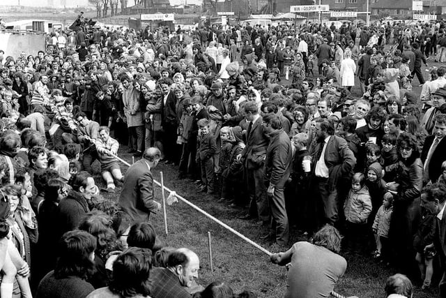 Crowds gather to watch tug of war at Orrell carnival in 1972