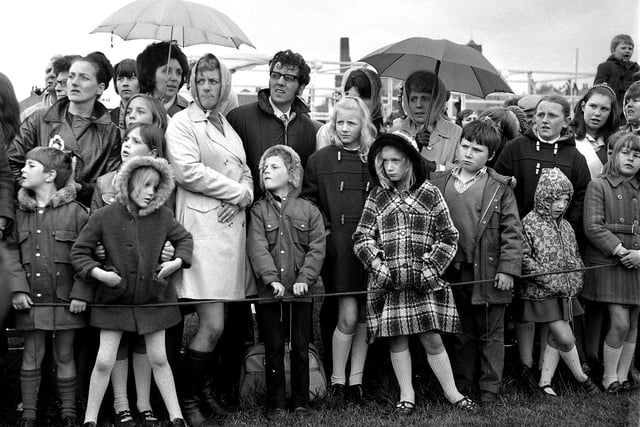 Crowds gather in the rain at Wigan carnival, 1972