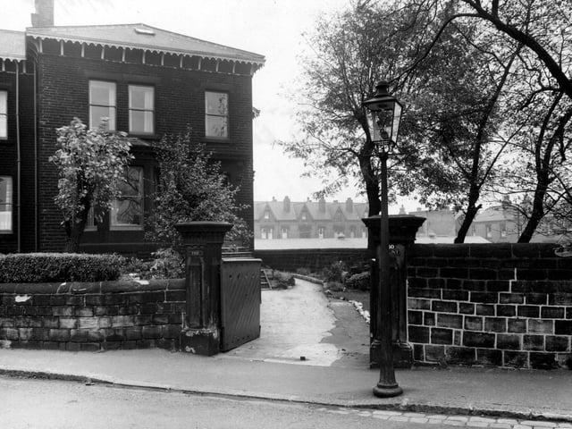 October 1954. Front entrance to number 40 Strawberry Lane, on the corner with Hall Lane. Laurel Terrace, Brentwood Terrace and Brooklyn Terrace are visible in the background.
