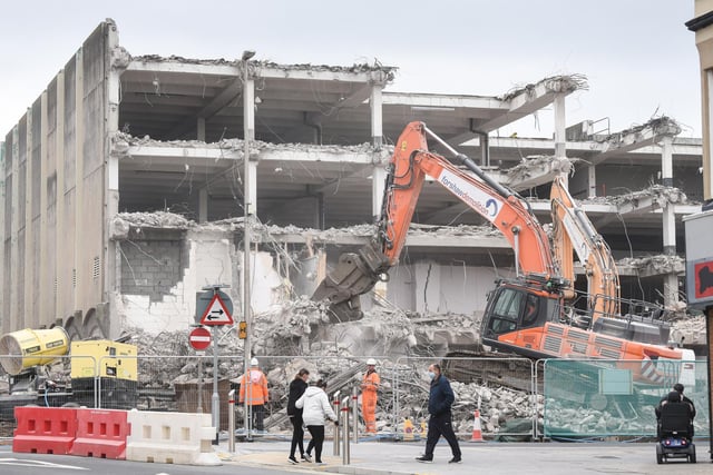 The demolition is quite a sight for pedestrians