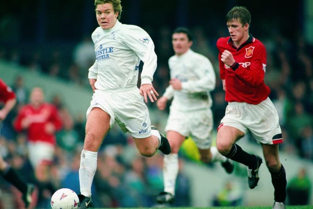 Tomas Brolin pulls away from David Beckham in December 1995. Was this kit is too baggy for your liking?